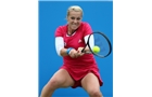 EASTBOURNE, ENGLAND - JUNE 16: Anastasia Pavlyuchenkova of Russia plays a backhand against Agnieszka Radwanska of Poland during their Women's Singles first round match on day three of the Aegon International at Devonshire Park on June 16, 2014 in Eastbourne, England.  (Photo by Steve Bardens/Getty Images)